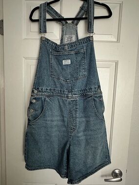 Levi’s women’s classic blue vintage shortalls overalls  | Large